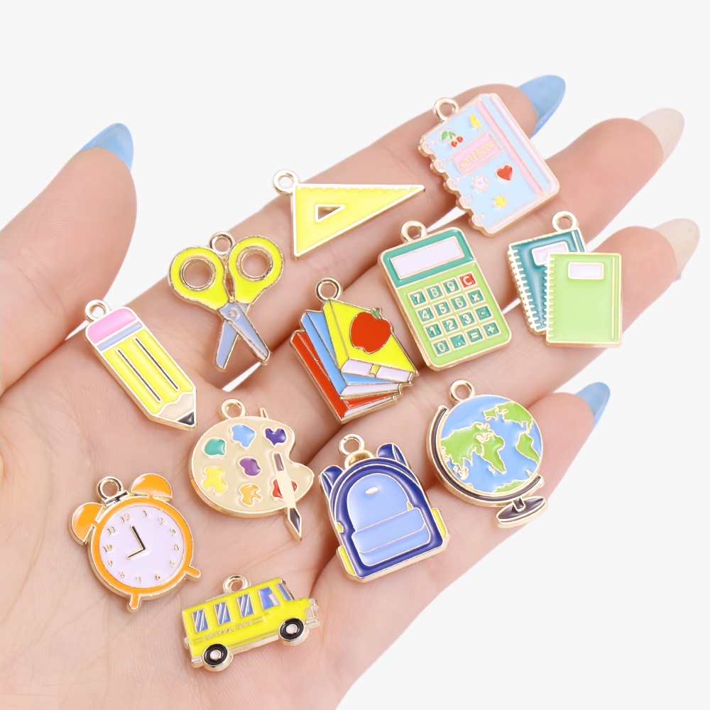 10 個かわいいブック鉛筆定規バックパックバスエナメルペンダ - Jewelry Making Guide Book のレビューと価格